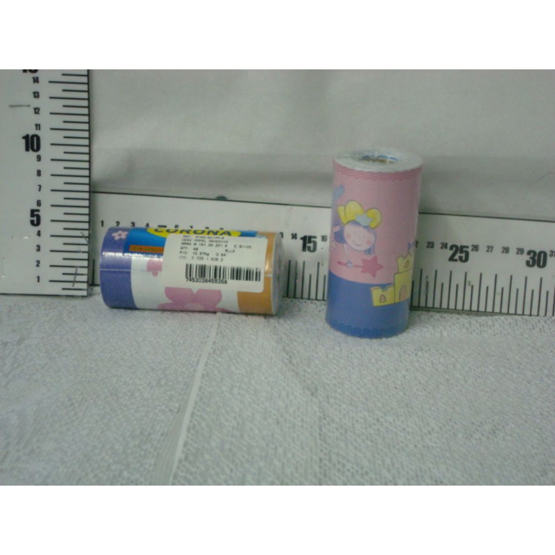PAPEL ADHESIVO CORONA FLORES Y HADA 10.6CM X 10M (F. 48 UNI)