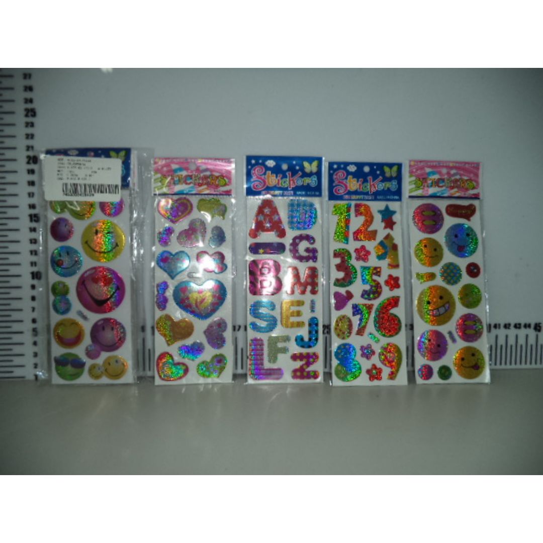 STICKERS BRILLANTES CARITAS/NUMEROS/CORAZONES/LETRAS (F. 20 DOC)